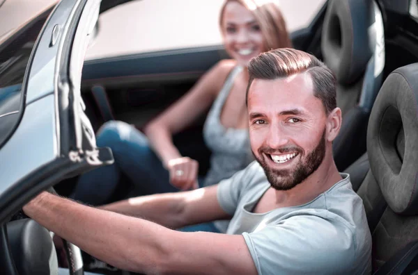 Top view.a young man traveling in a convertible car — Stock Photo, Image