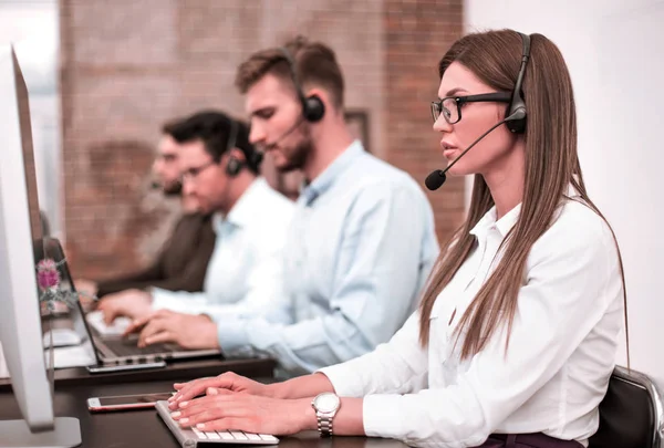 Young employee call center talking with the client — Stock Photo, Image