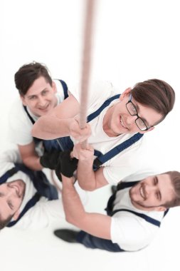 arka plan görüntüsü kadar yükselen işçilerin bir grup olduğunu