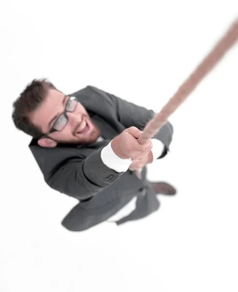 Empresário bem sucedido escalando a corda — Fotografia de Stock
