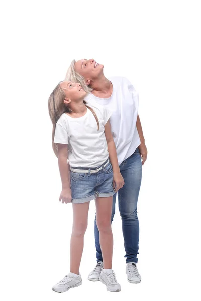 Full length . mom and daughter looking at copy space — Stock Photo, Image