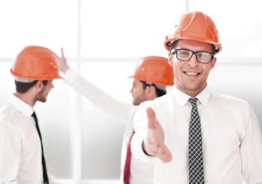 bir el sıkışma için uzanarak up.architect kapatın