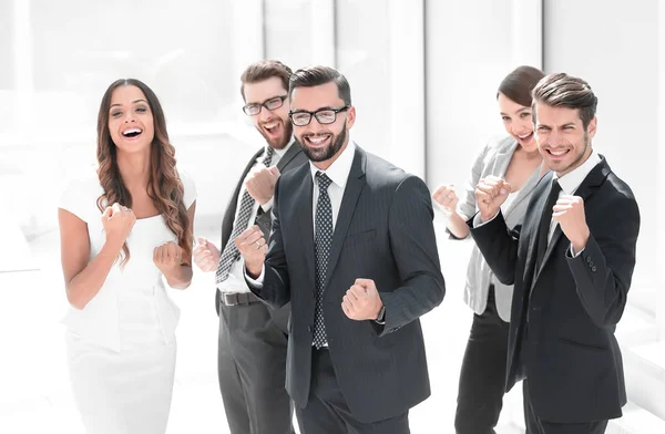 Happy business team standing in office. — Stock Photo, Image