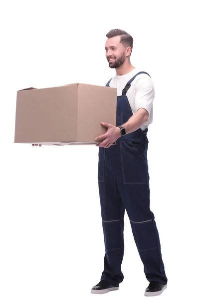 Rear view. a young man with a cardboard box looking at the camera — Stock Photo, Image