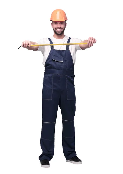 I full tillväxt. man Builder med konstruktion tejp mått — Stockfoto