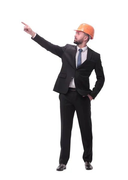 En pleno crecimiento. joven hombre de negocios en casco apuntando al espacio de copia — Foto de Stock