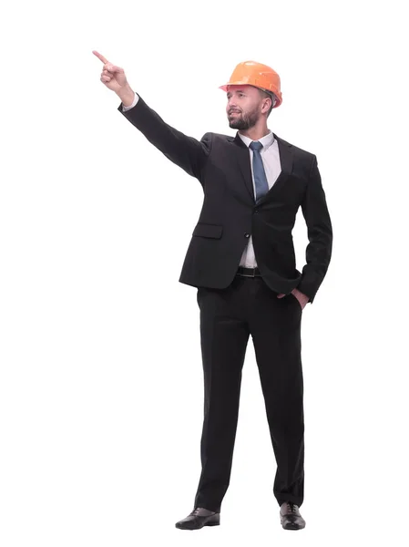 En pleno crecimiento. joven hombre de negocios en casco apuntando al espacio de copia — Foto de Stock