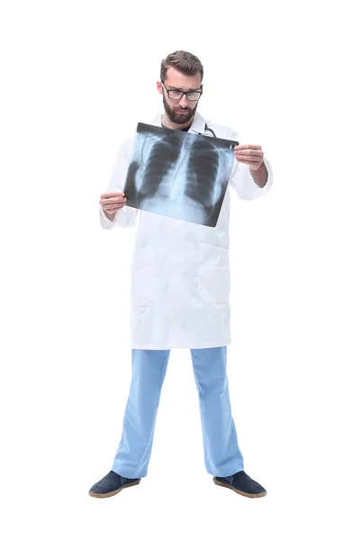 In full growth. doctor therapist looking at the x-ray — Stock Photo, Image