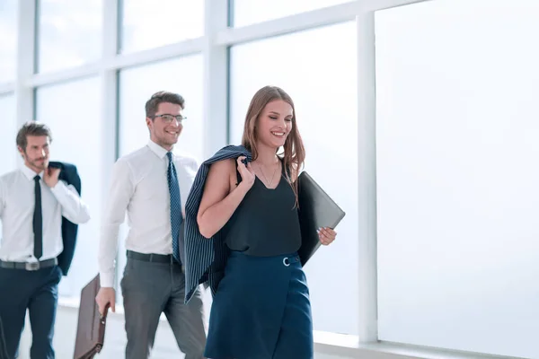 happy young employees finishing the working day