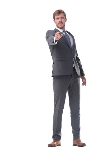 In full growth. serious businessman pointing to the side. — Stock Photo, Image