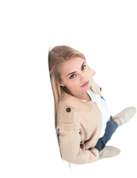 Sad business woman standing against the wall — Stock Photo, Image