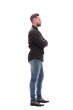 Yan görünüş. Kot giyen modern genç adam