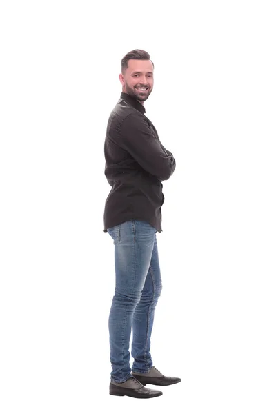 Zijaanzicht. moderne jongeman in jeans — Stockfoto