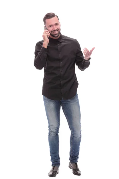 En pleno crecimiento. joven sonriente hablando en su teléfono inteligente —  Fotos de Stock