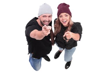 Üst Manzara. Bir çift genç hippi seni işaret ediyor.