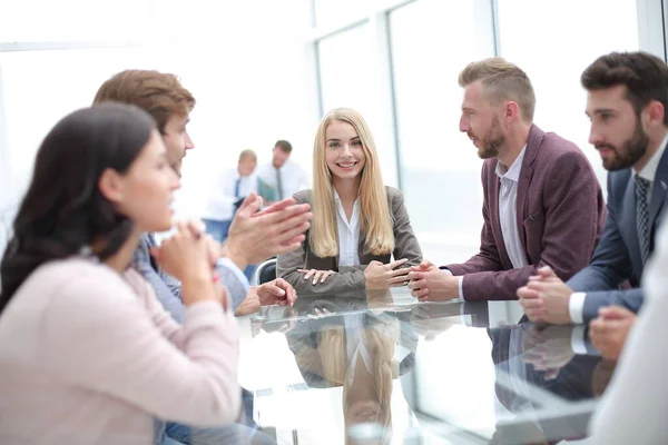Young businesswoman at a meeting with the business team — Stock Photo, Image
