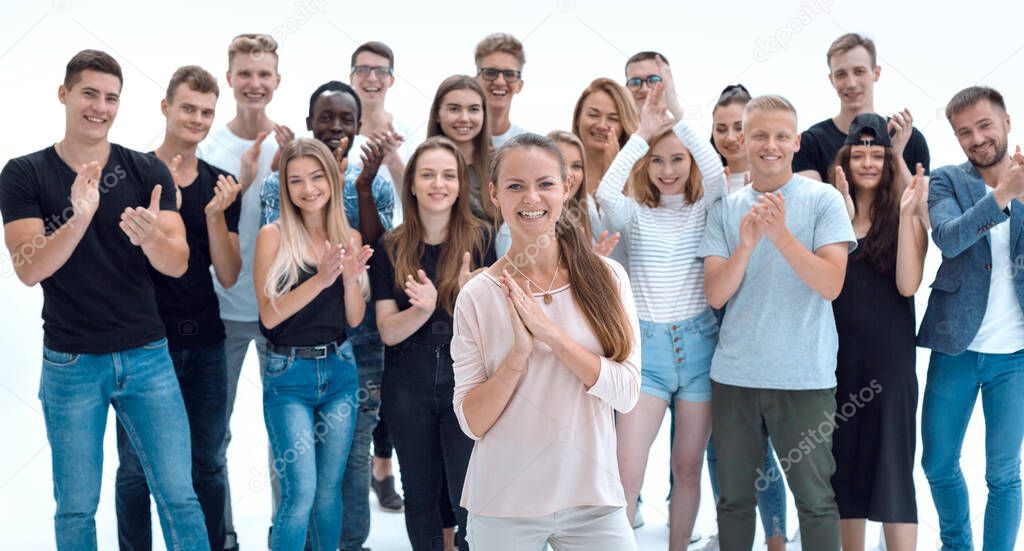 team of happy young people applauding together