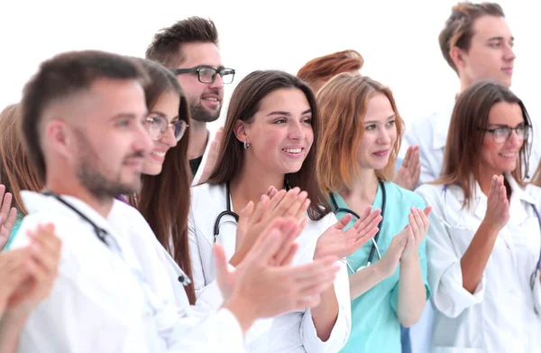 De cerca. un grupo de diferentes médicos aplauden juntos . — Foto de Stock