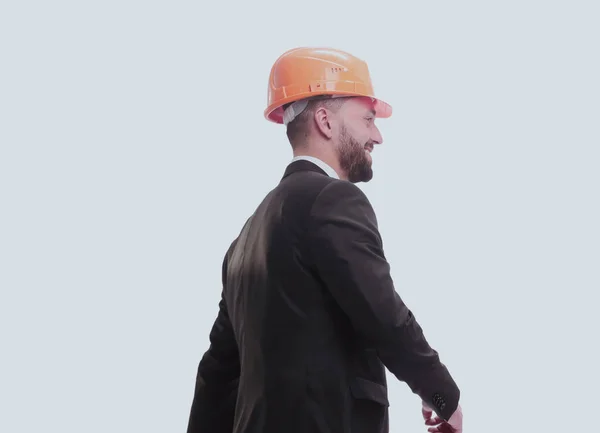 Lado view.smiling hombre de negocios en un casco en el futuro —  Fotos de Stock