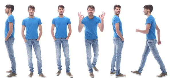 Zijaanzicht. moderne jongeman in jeans. — Stockfoto