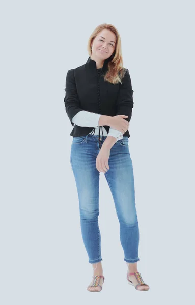 In full growth. a young woman in jeans and a black blouse — Stock Photo, Image