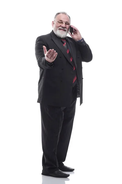 Amigable hombre de negocios hablando en su teléfono inteligente. aislado en un blanco —  Fotos de Stock