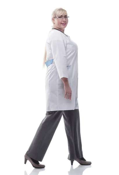 Confident woman doctor goes to help. isolated on a white — Stock Photo, Image