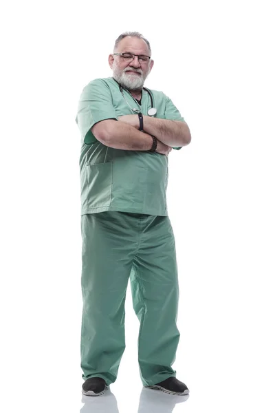 In full growth. smiling adult doctor looking at the camera — Stock Photo, Image