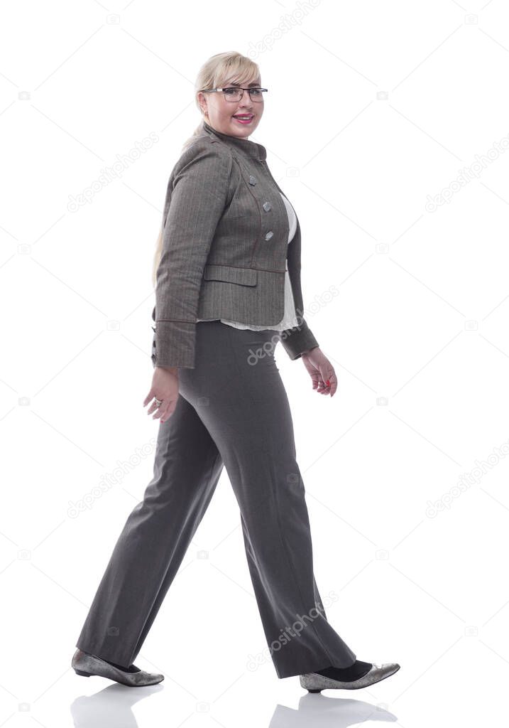 successful business woman stepping forward . isolated on a white