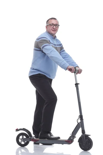 Side view. successful modern man with electric scooter — Stock Photo, Image