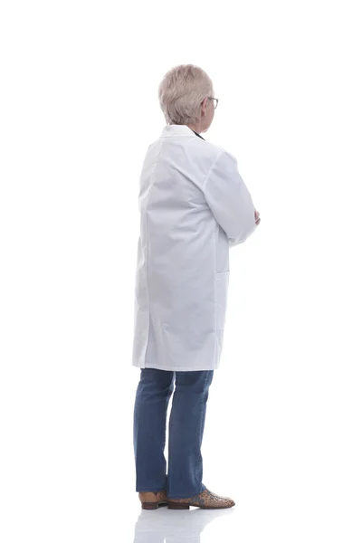 Visão traseira. maduro mulher médico ler algo em uma tela branca — Fotografia de Stock
