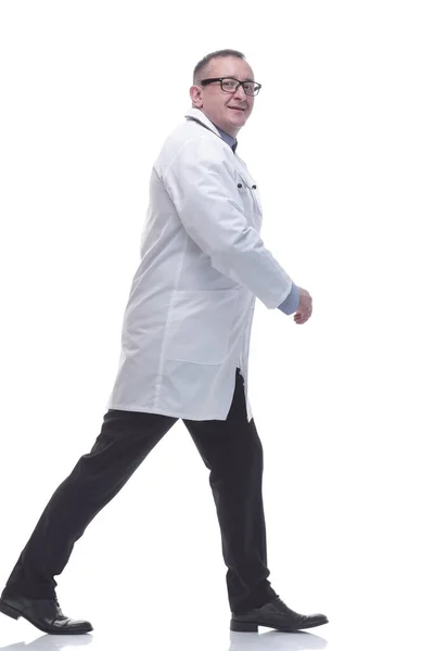 In full growth. confident male doctor striding forward — Stock Photo, Image
