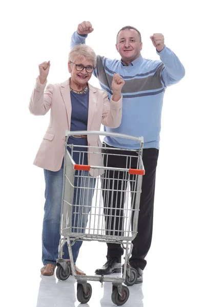 Em pleno crescimento. casal bonito com carrinho de compras. — Fotografia de Stock