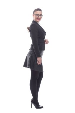 Yan görünüş. Kendine güvenen iş kadını kameraya bakıyor.