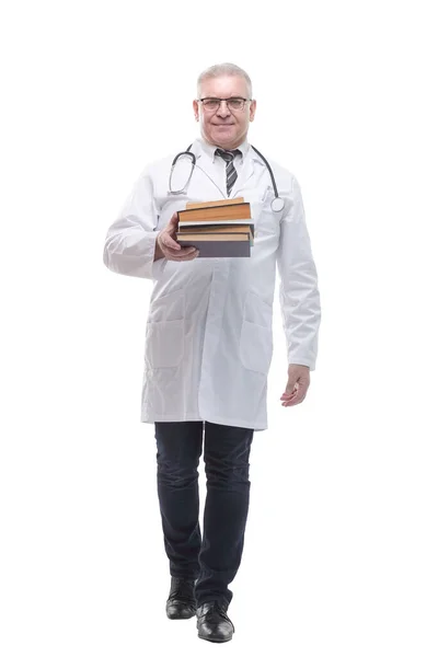 In full growth. a successful doctor with a stack of books — Stock Photo, Image