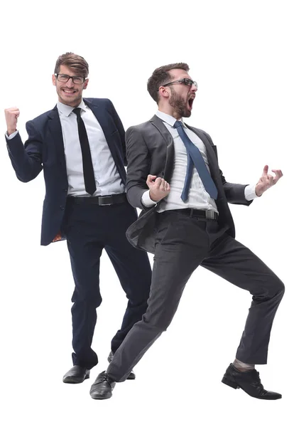 Freundlicher junger Geschäftsmann sitzt an seinem Schreibtisch — Stockfoto