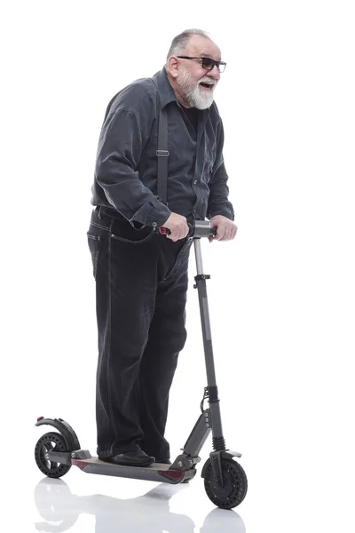 In volle groei. een oudere man met een elektrische scooter — Stockfoto