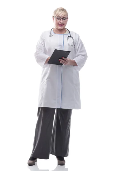 Female doctor with clipboard looking at camera — Stock Photo, Image