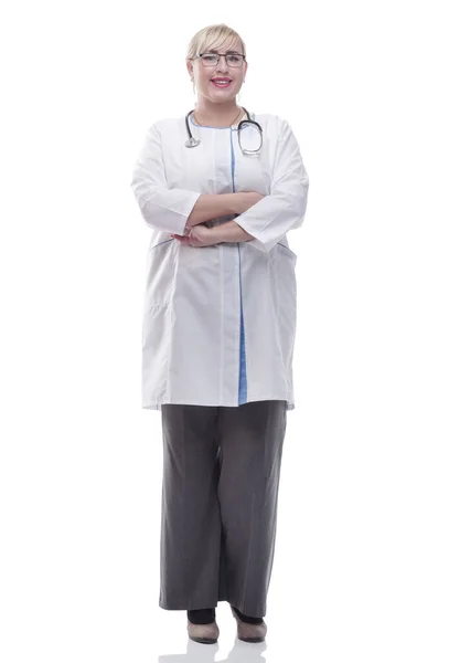 Friendly female doctor with clipboard looking at you — Stock Photo, Image