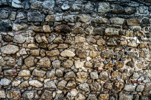 The wall of natural stone - natural background