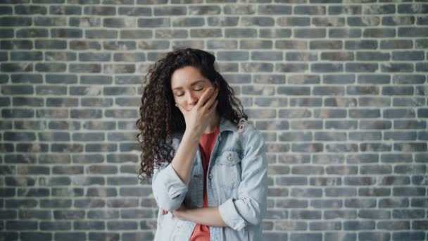 Portrait of sad young woman touching face and hair being depressed and sad — Stock Video