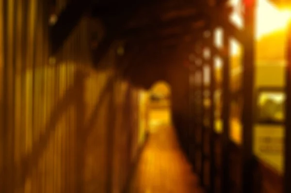 Blurred Background. Narrow walkway in construction zone.