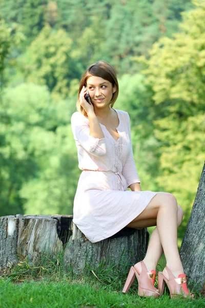 Happy Blonde Calling Phone Young Beautiful Woman Beige Dress Sits — Stock Photo, Image