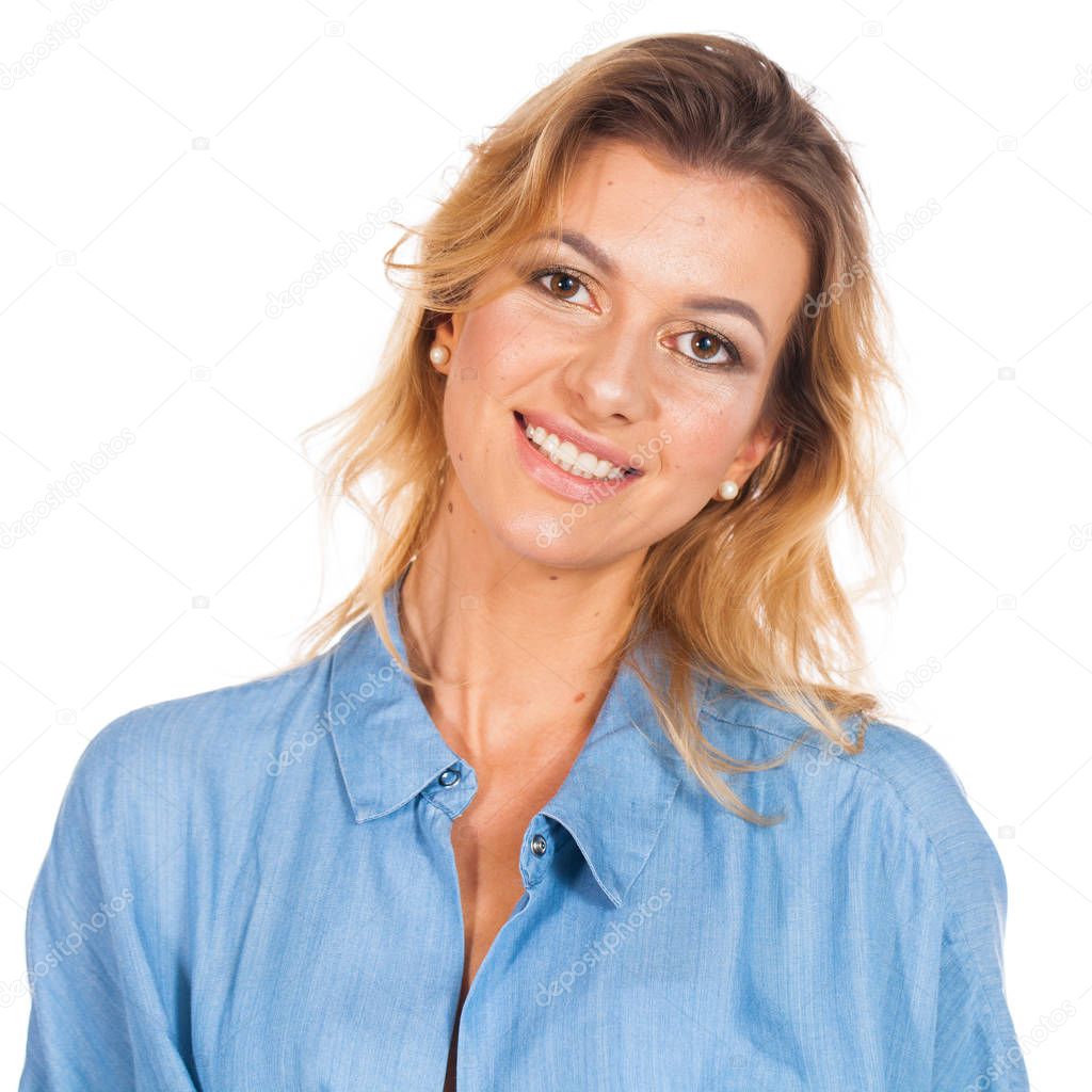 Real people without retouching. Portrait of a young beautiful blonde woman with moles on her face, isolated on white background