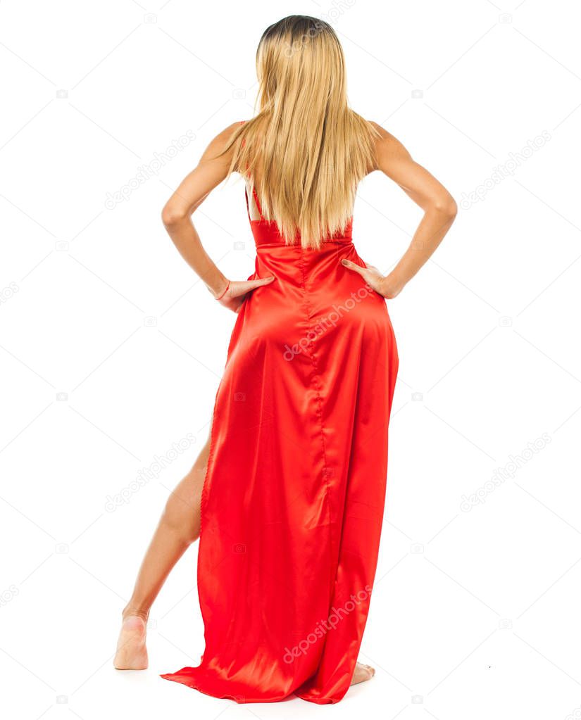 African fashion model. Portrait in full growth of a beautiful young woman in red dress, isolated on white background