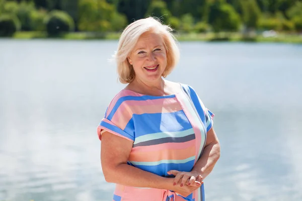 Happy Elderly Blonde Woman Blue Dress Background Summer Park — Stock Photo, Image