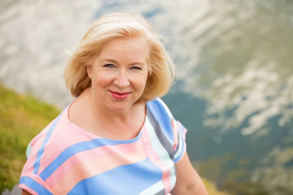 Happy Elderly Blonde Woman Blue Dress Background Summer Park — Stock Photo, Image