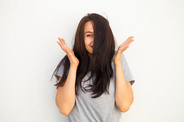 Wow. Portrait of a young beautiful brunette woman, isolated on white background