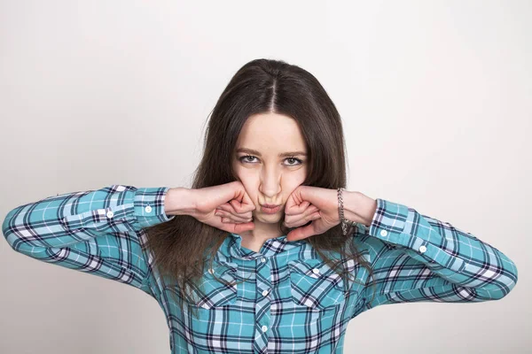 Beautiful Emotional Girl Plaid Shirt Grimaces Posing Studio — Stock Photo, Image