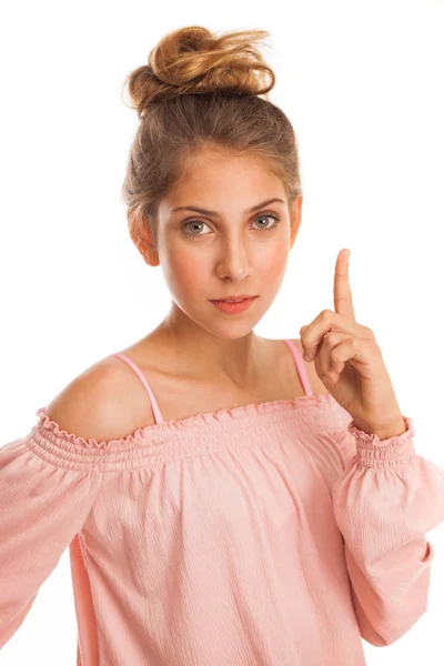 Ομορφιά Κορίτσι Δείχνει Προς Επάνω Δάχτυλό Της Απομονώνονται Λευκό Φόντο — Φωτογραφία Αρχείου